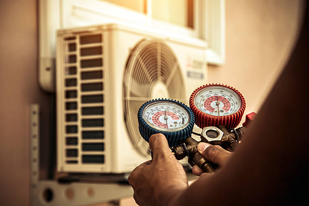 Professional Hvac technician working in Moreland, GA